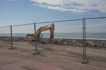 loader excavator tractor, beach road construction
