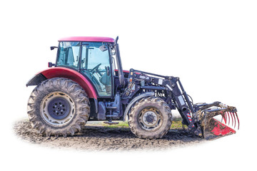 Side view of a powerful tractor with a front loader for manure mixed with straw. A wonderful fertilizer. Isolated photo. Equipment for a dairy farm.