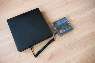 Digital weight scale for refrigerant tank equipment for filling air conditioners.