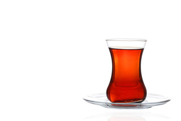 Turkish tea in traditional glass isolated on white background