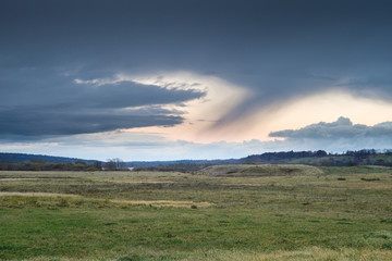 Obraz premium Dramatic sky just before the rain over the hill. Lithuania, Europe.