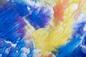 Mix of yellow, green, red, blue colors on gouache texture background