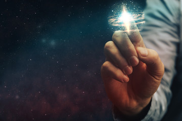 Forefinger touches a new star in infinite space.