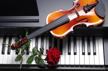 Fototapeta premium Violin, rose and keyboard synthesizer