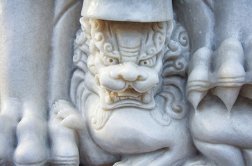 Marble statue of a mythical lion in Asian style. Mui Ne, Province Binh Thuan, Phan Thiet, Vietnam.