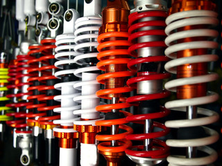 Assorted colorful motorcycle shock absorbers