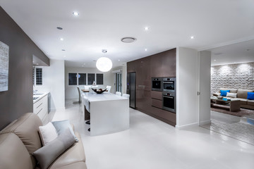 Luxurious living room with a kitchen and dining area
