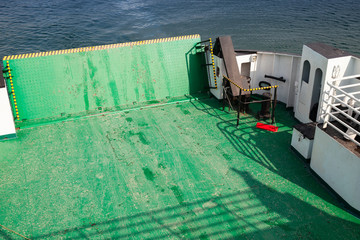 Empty green ferry deck