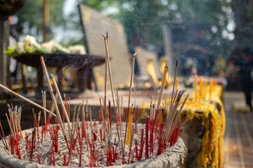 incense sticks in temple in thailand