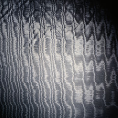 grey satin glossy cloth material texture with threads background