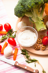 Healthy food concept. Fresh organic vegetables on the red polka-dot background. Ingredients for cooking. Close up. Top view.