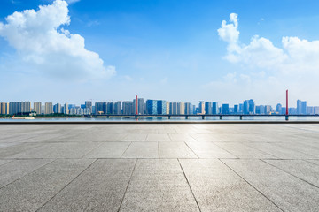 Fototapeta na wymiar Beautiful Hangzhou city skyline panoramic and empty square floor