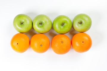 green apple orange fruit on white background