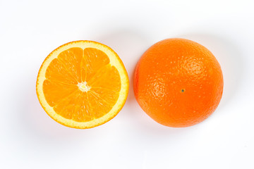 Orange Fruit half cut slices top view white background