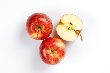 Red apple whole half cut slice top view on white background