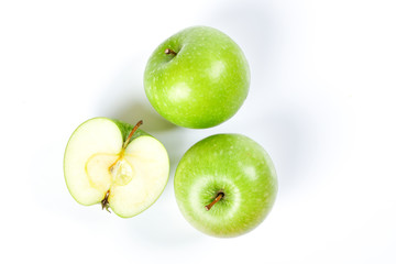 green apple whole half cut slice top view on white background
