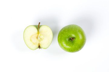 green apple whole half cut slice top view on white background