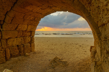 Sunset view of and arch of the Roman Aqueduct, Caesarea