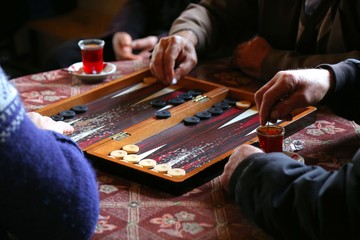 people playing backgammon