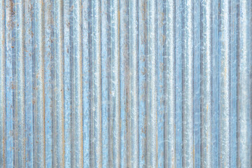 Rusty corrugated metal wall or rusty Zinc grunge and wood plank for background.