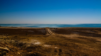 Panorama view to Aral sea from the rim of Plateau Ustyurt near Duana cape in Karakalpakstan, Uzbekistan