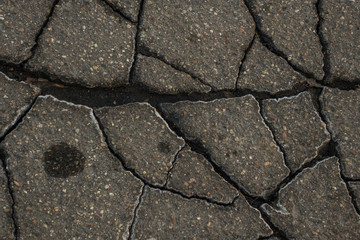 old cracked asphalt close up