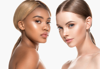Two wemen with dark and light skin tone caucasian and african american models with different skintones lines beauty healthy concept - obrazy, fototapety, plakaty
