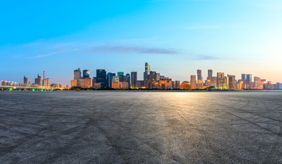 Empty asphalt square ground and Hangzhou business district cityscape