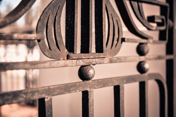forged metal fence in retro style