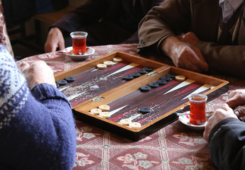 people playing backgammon