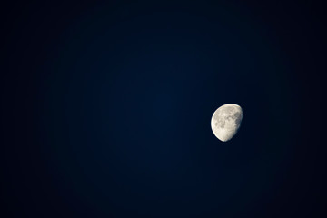 The beauty of Half moon On the night sky.