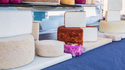 Different types of goat cheese in the market of Teguise in Lanzarote