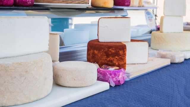 Different types of goat cheese in the market of Teguise in Lanzarote