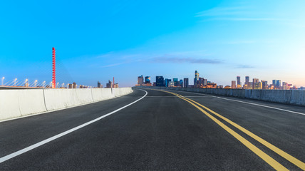 Fototapeta premium Empty asphalt road through Hangzhou business district,panoramic view