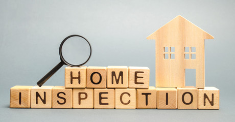 Wooden blocks with the word Home Inspection and the house. Resale residential property condition....