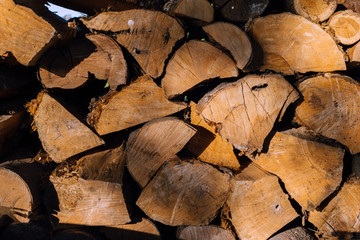 stack of firewood. Pile of wood. Texture rustic grunge background