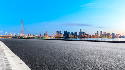 Fototapeta na wymiar Empty asphalt road through Hangzhou business district,panoramic view
