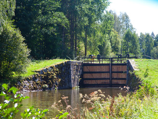 Typical old historic canal lock in Hjalmaren canal, Arboga, Sweden