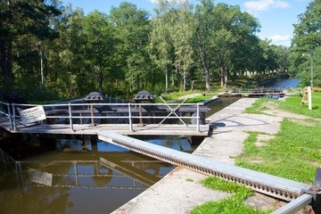 Typical old historic canal lock in Hjalmaren canal, Arboga, Sweden