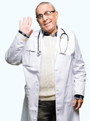Handsome senior doctor man wearing medical coat Waiving saying hello happy and smiling, friendly welcome gesture