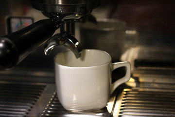 Coffee machine and white cup