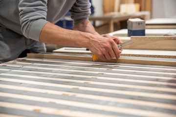 Carpenter work on wood plank