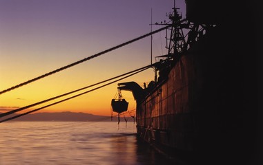 Fototapeta na wymiar Ship at sunset