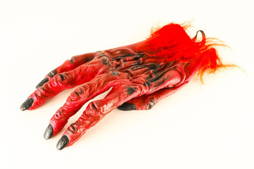 Close-up of carnival mask devil glove