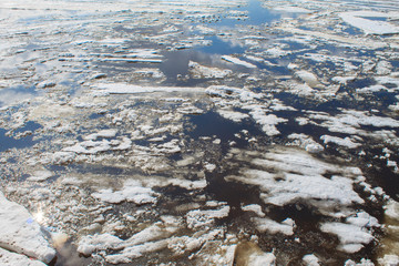 beginning of spring ice drift on the river