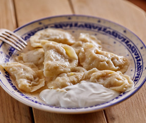 delicious dumplings with sour cream