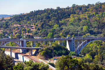 Panoramic view on Lisbon. Travel Portugal. Roads and bridges in big european city