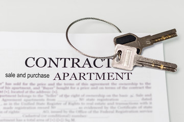 is a contract for the purchase of an apartment. there are two keys to them.