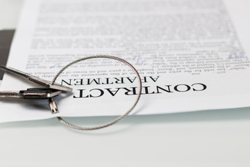 is a contract for the purchase of an apartment. there are two keys to them.