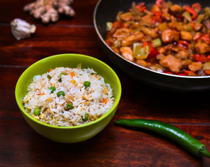 Stir fry chicken with vegetables and risee. Asian cuisine.